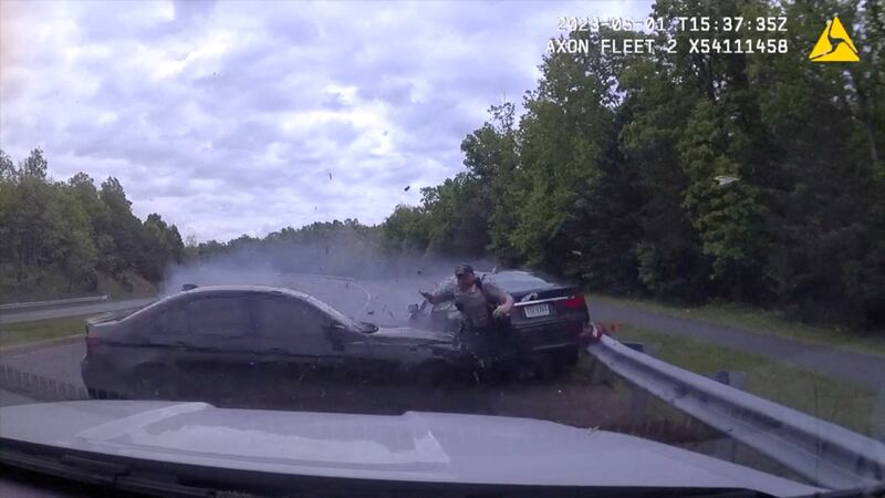 A police officer narrowly escapes a high-speed crash in Fairfax County, Virginia. Reuters