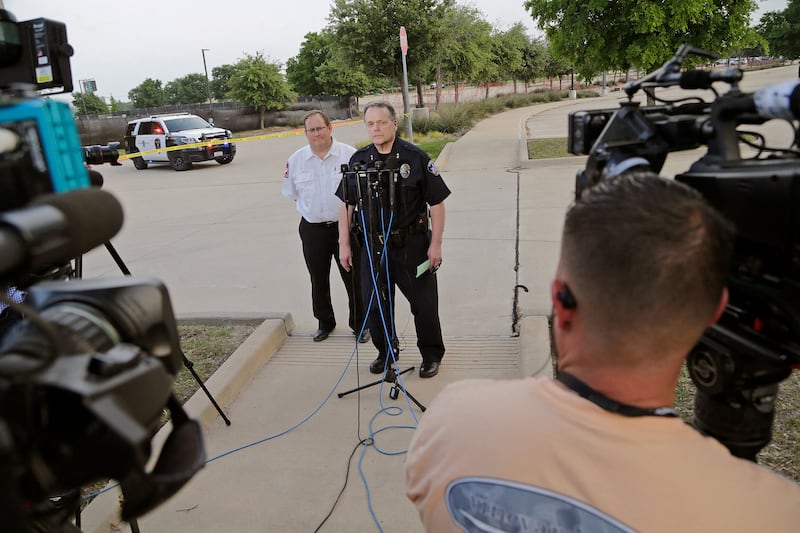 Allen Fire Marshall Jonathan Boyd (L) and Police Chief Brian Harvey speak to the press at the scene. AFP