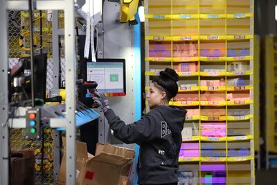 A worker at a new Amazon same day shipping facility in Richmond, California. AFP