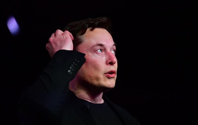 (FILES) In this file photo taken on March 14, 2019 Tesla CEO Elon Musk speaks during the unveiling of the new Tesla Model Y in Hawthorne, California. Tesla announced on April 3, 2019 that it will give investors an up-close look at its self-driving car in a bid to bolster confidence in the progress of the nascent technology.
Tesla co-founder and chief executive Elon Musk and other executives will take part in presentations to investors at the company's Silicon Valley headquarters on April 19.

 / AFP / Frederic J. BROWN
