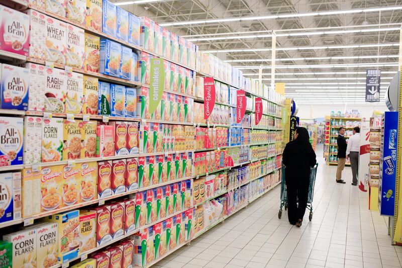 DUBAI, UAE. January 22, 2014 - A woman shops for breakfast cereal at Geant Hypermarket in Dubai, January 23, 2014.  (Photo by: Sarah Dea/The National, Story by: STANDALONE, Stock)

