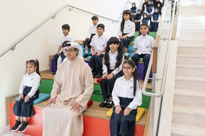 Sheikh Mansour bin Zayed, Vice President, Deputy Prime Minister and Minister of the Presidential Court, with pupils at a new public school in Fujairah. Photo: UAE Presidential Court