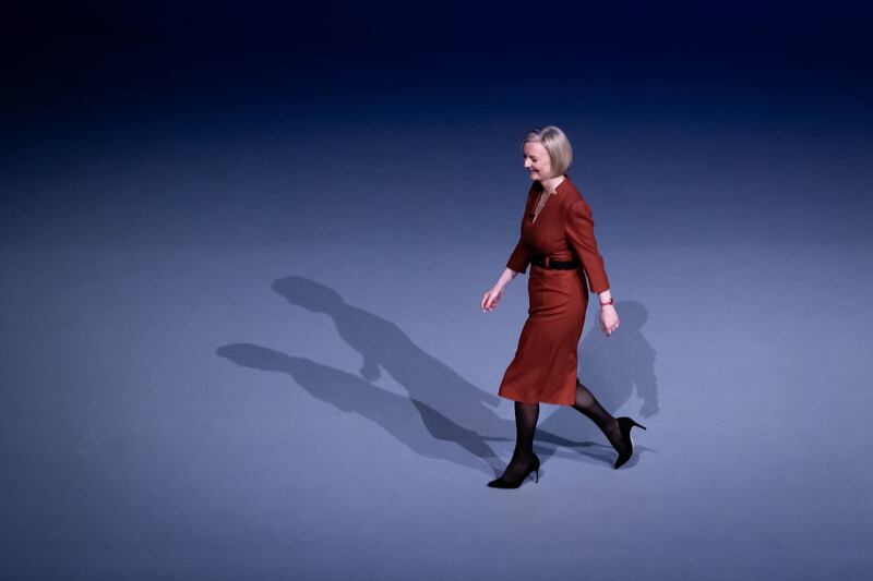 Liz Truss walks off stage after delivering her keynote speech at the Conservative Party annual conference at the International Convention Centre in Birmingham in October. PA