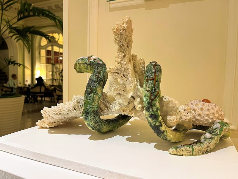 The artist's Shellfish series features ceramic sea snakes, bright coral, the remains of sea urchins and pastel-hued shells, like imagined reefs teeming with marine life. Maghie Ghali for The National