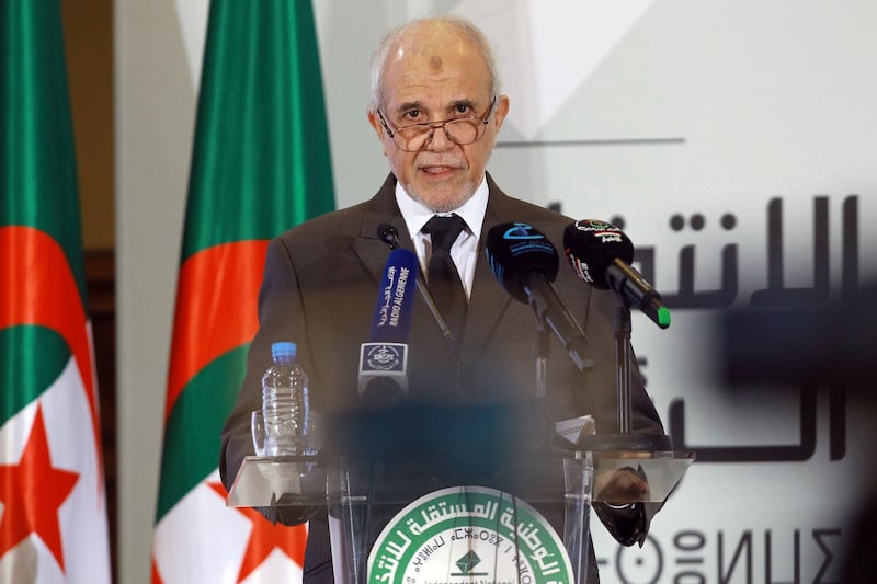 National Independent Electoral Authority, Mohamed Charfi, announces the results of Algeria's presidential election. AP