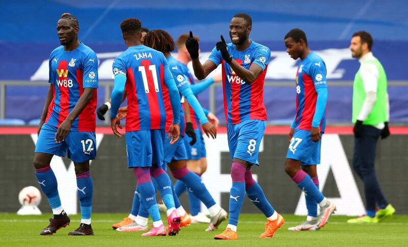 LONDON, ENGLAND - SEPTEMBER 26: Cheikhou Kouyate of Crystal Palace celebrates after scoring his team's first goal during the Premier League match between Crystal Palace and Everton at Selhurst Park on September 26, 2020 in London, England. Sporting stadiums around the UK remain under strict restrictions due to the Coronavirus Pandemic as Government social distancing laws prohibit fans inside venues resulting in games being played behind closed doors. (Photo by Clive Rose/Getty Images)