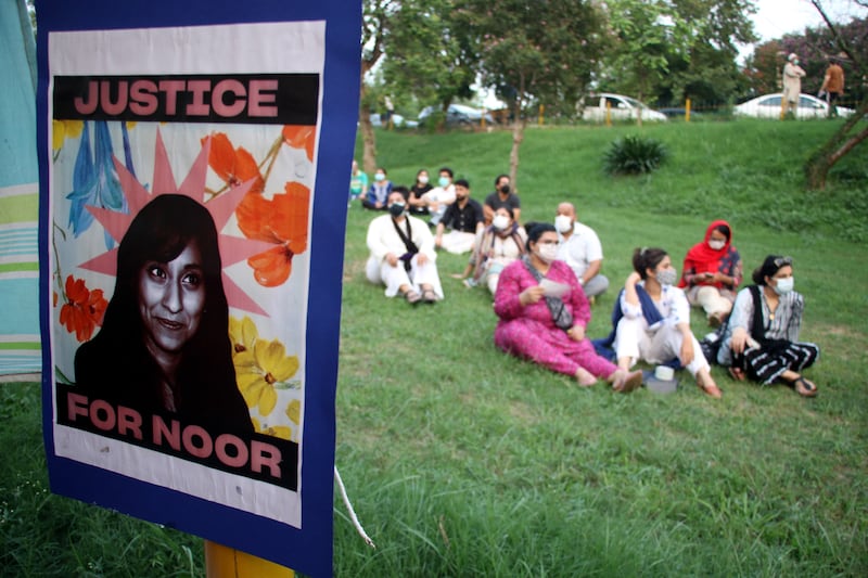 People gather during a protest for justice after a girl Noor Mukadam, was murdered in Islamabad, Pakistan. EPA
