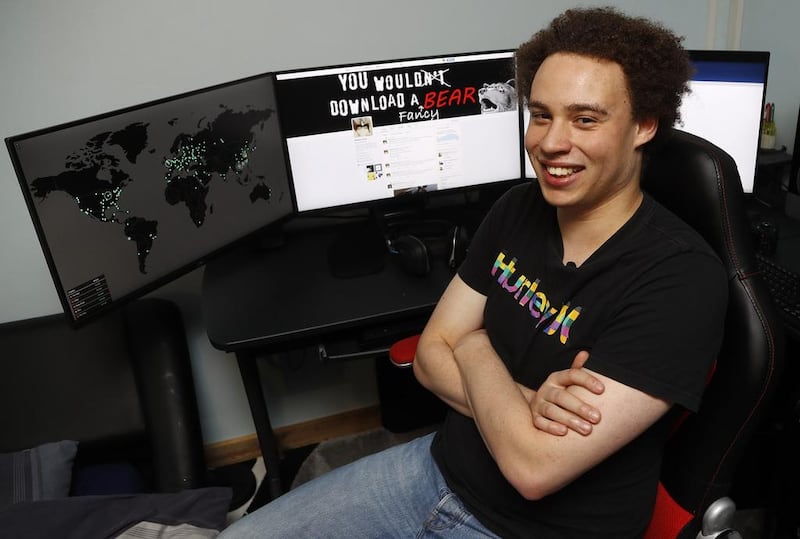 British IT expert Marcus Hutchins who has been branded a hero for slowing down the WannaCry global cyber attack, sitting at his workstation in Ilfracombe, England on May 15, 2017.  Mr Hutchins says he does not consider himself a hero but fights malware because it's 'the right thing to do'. Frank Augstein/AP Photo