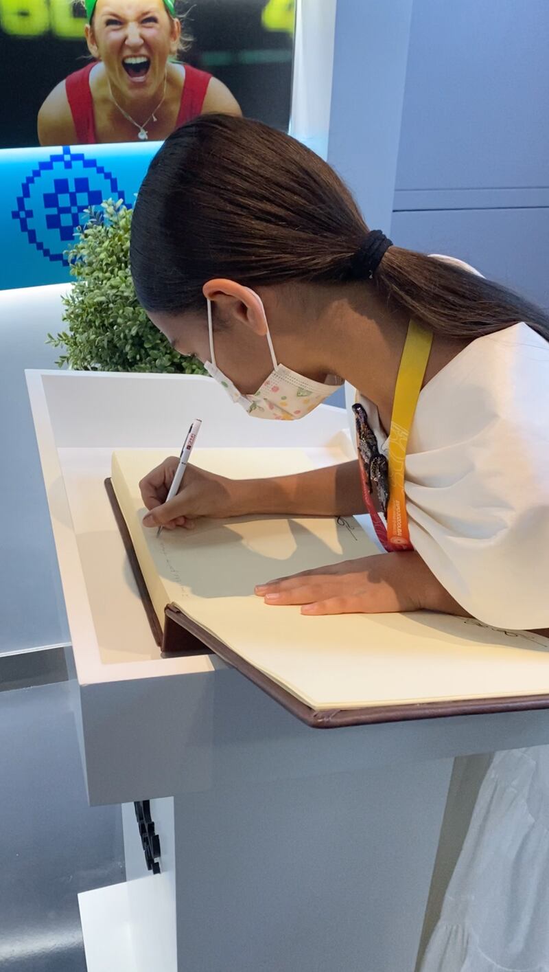 Mira was invited to sign the visitors’ book at the Belarus pavilion. Photo: Suhail Akram / The National