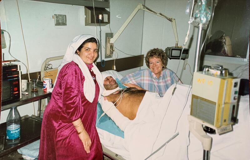 Christine Rendel with a burns patient at the Ibn Sina Hospital in Kuwait. Courtesy: Christine Rendel