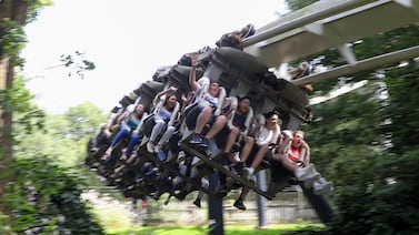 Visitors ride the Nemesis rollercoaster at Alton Towers, owned by Merlin Entertainments, which is introducing surge pricing at times of high demand. Getty Images
