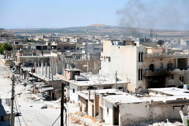 Smoke rises in Khan Sheikhun.