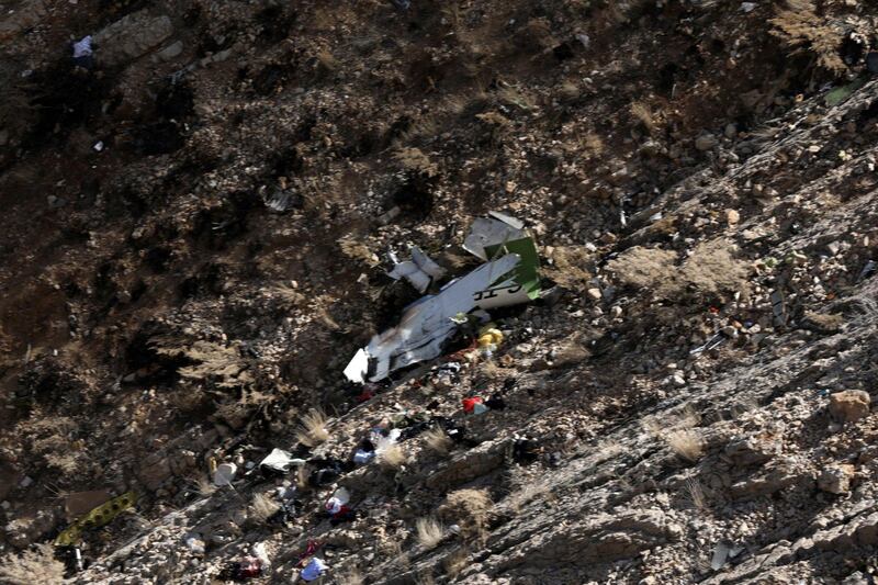 The wreckage of private jet is seen on a slope of a mountain around the city of Shahr-e Kord, Iran. Alireza Motamedi / EPA