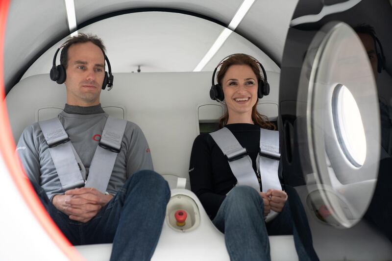 Virgin Hyperloop executives Josh Giegel, its Chief Technology Officer, and Sara Luchian, Director of Passenger Experience are seen inside a Virgin Hyperloop pod during testing at their DevLoop test site in Las Vegas, Nevada. Reuters