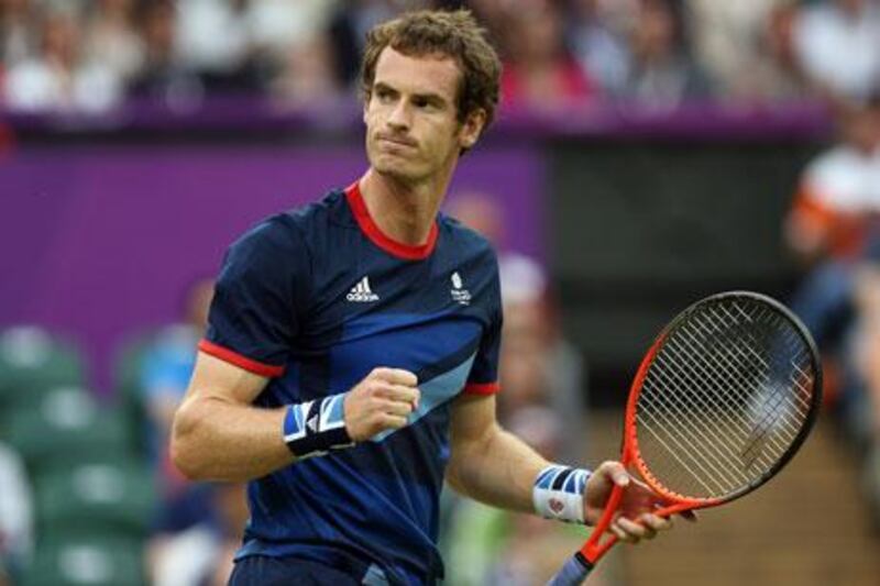 Andy Murray celebrates a point against Jarkko Nieminen at London 2012's tennis tournament