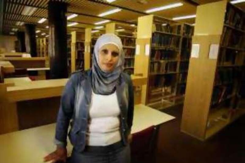 Sawsan Salameh, at the Hebrew University in Jerusalem on Thursday August 21, 2008.
Sawsan is a Palestinian resident of Anata neighborhood near Ramallah (Palestinian territory) and studies in chemistry. Sawsan have a permission to enter Israel only 3 times a week with restricted hours (5:00AM to 07:00PM) which affect her studies.
Photo by Ilan Mizrahi
 *** Local Caption ***  Sawsan006.jpg