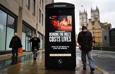 epa08951769 A coronavirus public health notice at a bus stop in London, Britain, 20 January 2021. Britain's National health service (NHS) is coming under sever pressure as Covid-19 hospital admissions continue to rise across the UK. Some one thousand people are dying each day from the disease.  EPA/ANDY RAIN