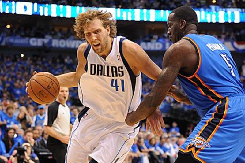 Dirk Nowitzki, left, has used the 2011 NBA play-offs to re-establish his image across the league. Once thought of as a big man who plays beyond the arc, the German has shed his soft image with clutch plays.