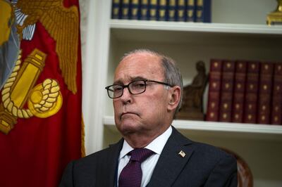 Larry Kudlow, director of the U.S. National Economic Council, listens during a phone conversation between U.S. President Donald Trump and Enrique Pena Nieto, Mexico's president, not pictured, in the Oval Office of the White House in Washington, D.C., U.S., on Monday, Aug. 27, 2018. Trump said he would terminate the North American Free Trade Agreement and sign a new trade accord with Mexico, potentially leaving Canada out of the bloc. Photographer: Al Drago/Bloomberg