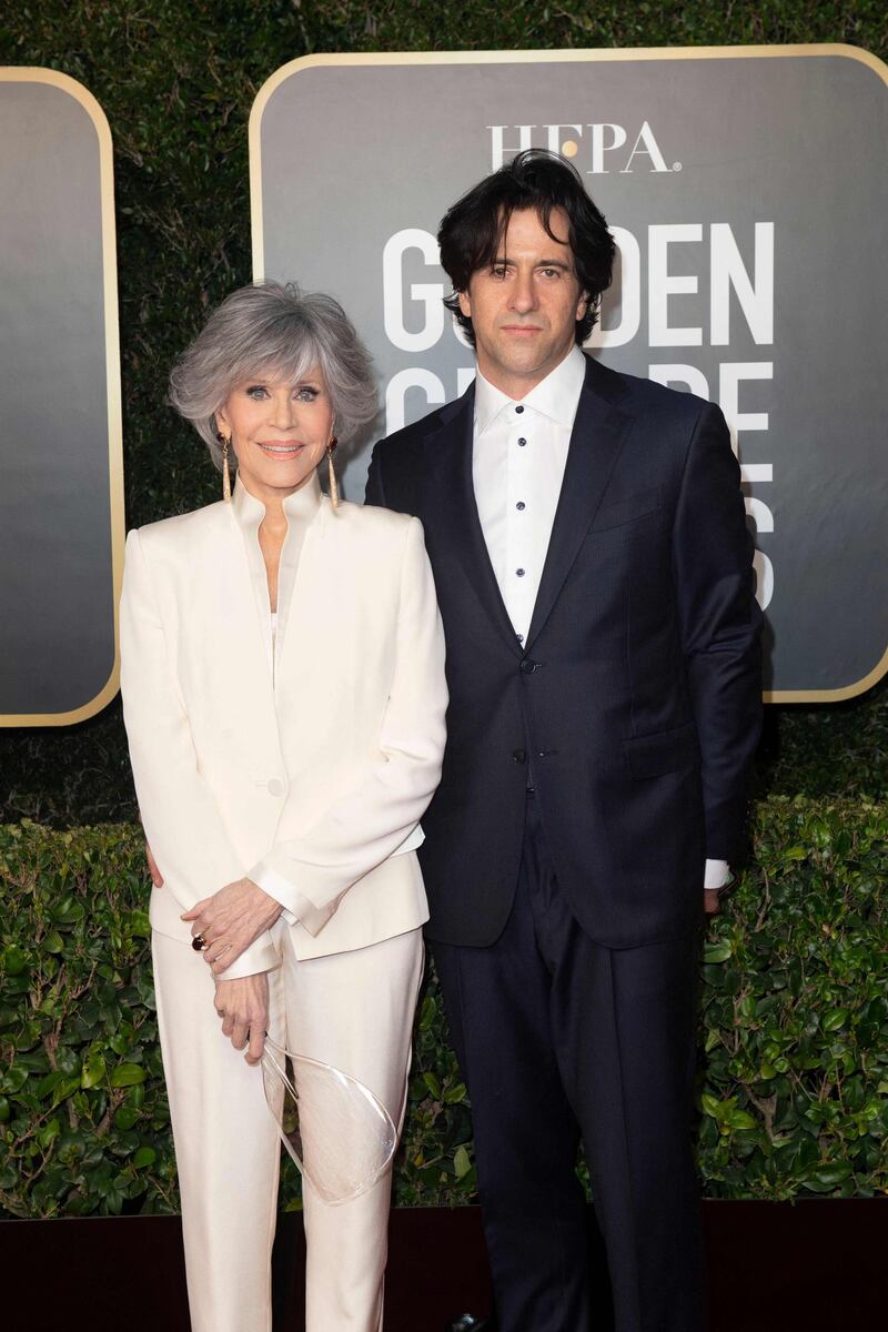 Jane Fonda, in Richard Tyler, and her son, Troy Garity, attend the 78th annual Golden Globe Awards in Beverly Hills, California, on February 28, 2021. AFP