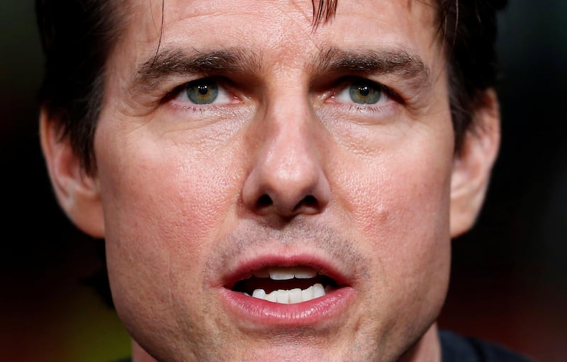 FILE PHOTO: Hollywood actor Tom Cruise speaks during a news conference for his movie "Edge of Tomorrow" in Tokyo, June 27, 2014.   REUTERS/Yuya Shino/File Photo