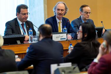 From left, Ahmad Kuzbari, co-chair for the Syrian government, UN Special Envoy for Syria Geir Pedersen and Hadi Al Bahra, co-chair for the Syrian opposition, at the meeting of the Syrian Constitutional Committee in Geneva on October 31, 2019. Reuters