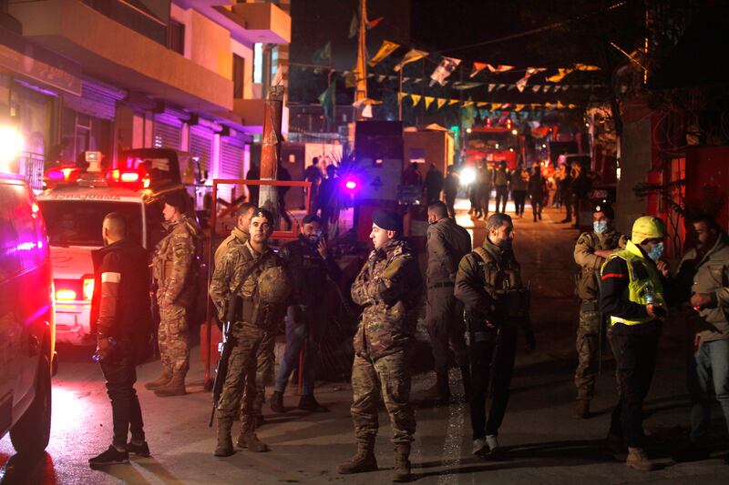 Lebanese soldiers and security forces block the main entrance to the Burj Shamali Palestinian refugee camp following an explosion. AP Photo