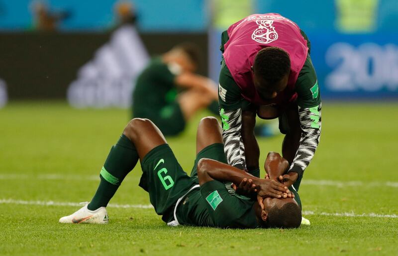 Nigeria's Odion Ighalo cries at the end of the group D match between Argentina and Nigeria. Ricardo Mazalan / AP Photo