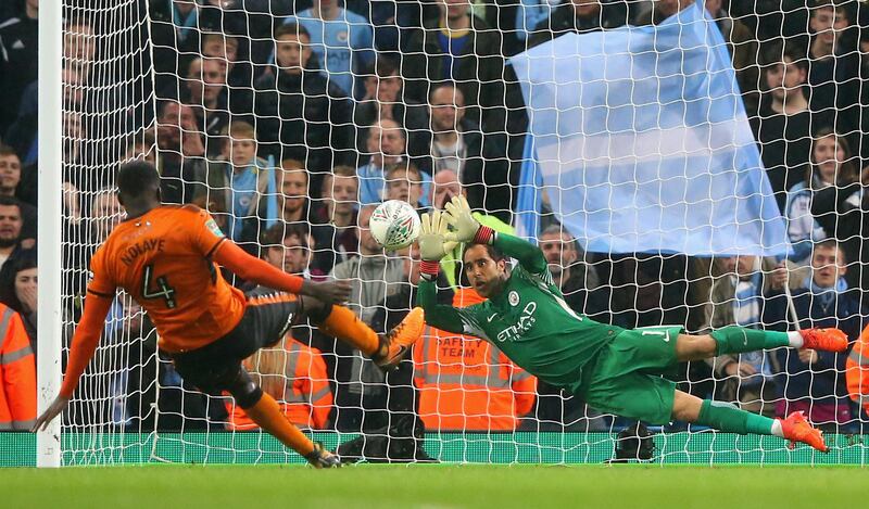 MANCHESTER, ENGLAND - OCTOBER 24:  Claudio Bravo of Manchester City saves penalty during the Carabao Cup Fourth Round match between Manchester City and Wolverhampton Wanderers at Etihad Stadium on October 24, 2017 in Manchester, England.  (Photo by Alex Livesey/Getty Images)