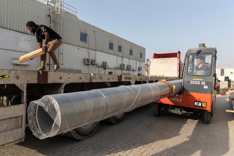 Trident Support has a joint venture with Fabtech International, a steel fabrication company in Jebel Ali, that builds the big flagpoles. 
