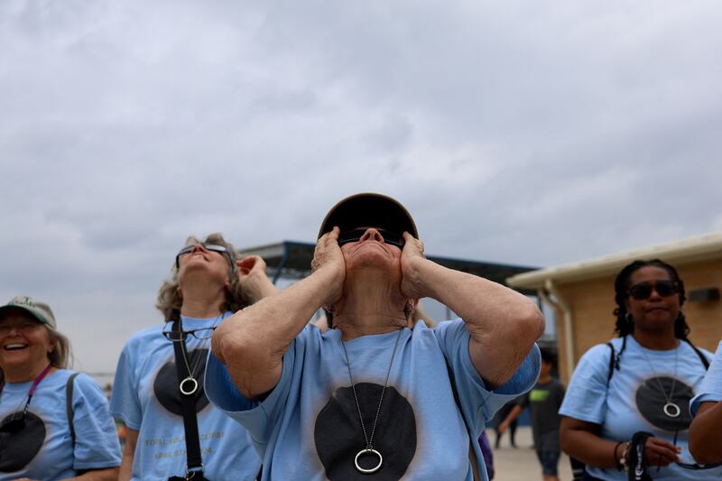 People assemble to view the total solar eclipse in Eagle Pass, Texas. Reuters