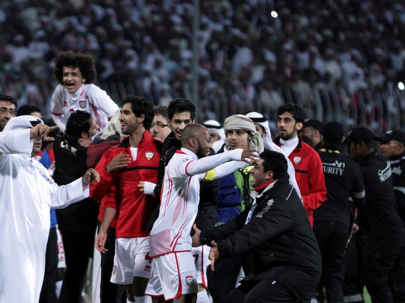 United Arab Emirates team celebrate at the end of their match against Iraq in the Gulf Cup final Friday, Jan. 18 , 2013, in Rifa, Bahrain. United Arab Emirates beat Iraq 2-1 in extra time on Friday to claim its second Gulf Cup title. (AP Photo/Hasan Jamali) *** Local Caption ***  Bahrain Gulf Cup.JPEG-00f42.jpg