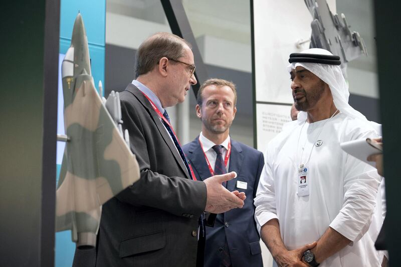 ABU DHABI, UNITED ARAB EMIRATES - February 17, 2019: HH Sheikh Mohamed bin Zayed Al Nahyan, Crown Prince of Abu Dhabi and Deputy Supreme Commander of the UAE Armed Forces (R), speaks with a representative of from MBDR during a tour of the 2019 International Defence Exhibition (IDEX), at Abu Dhabi National Exhibition Centre (ADNEC).

( Ryan Carter / Ministry of Presidential Affairs )
---