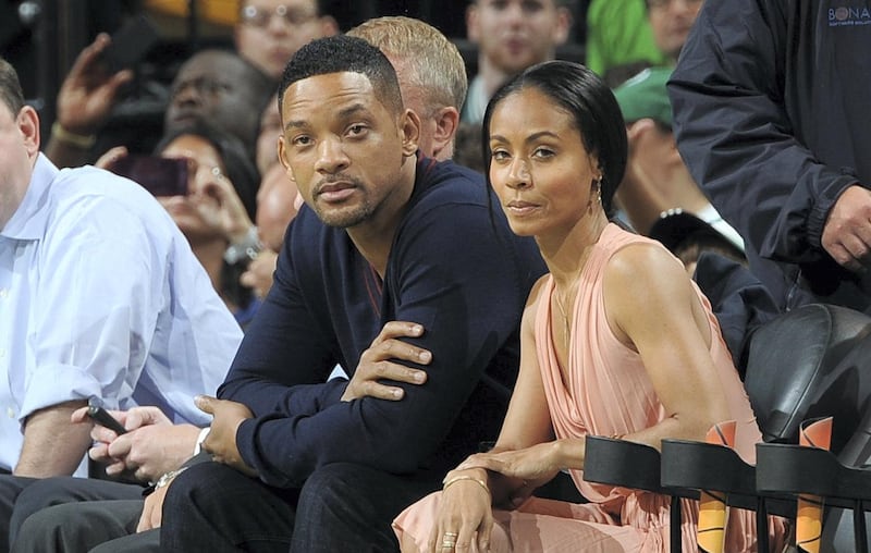BOSTON, MA - MAY 21: Actors Will and Jada Pinkett Smith in attendance for the game between the Philadelphia 76ers and the Boston Celtics in Game Five of the Eastern Conference Semifinals during the 2012 NBA Playoffs on May 21, 2012 at TD Garden in Boston, Massachusetts. NOTE TO USER: User expressly acknowledges and agrees that, by downloading and or using this photograph, User is consenting to the terms and conditions of the Getty Images License Agreement. Mandatory Copyright Notice: Copyright 2012 NBAE   Brian Babineau/NBAE via Getty Images/AFP