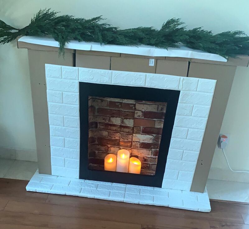 A textured white brick wallpaper was used.