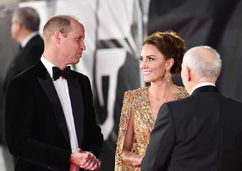 The Duke and Duchess of Cambridge are greeted by Michael G Wilson at the event. Photo: Getty