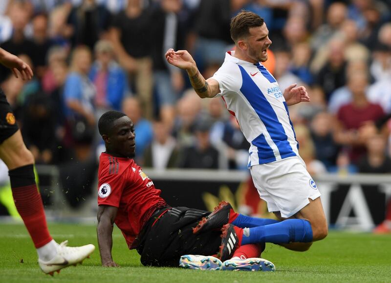 Manchester United defedner Eric Bailly of tackles Pascal Gross. Getty Images