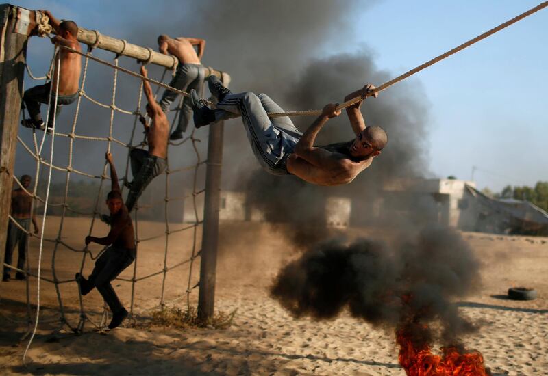Palestinian cadets demonstrate their skills at a police college run by the Hamas-led interior ministry in Khan Younis in the southern Gaza Strip. Reuters