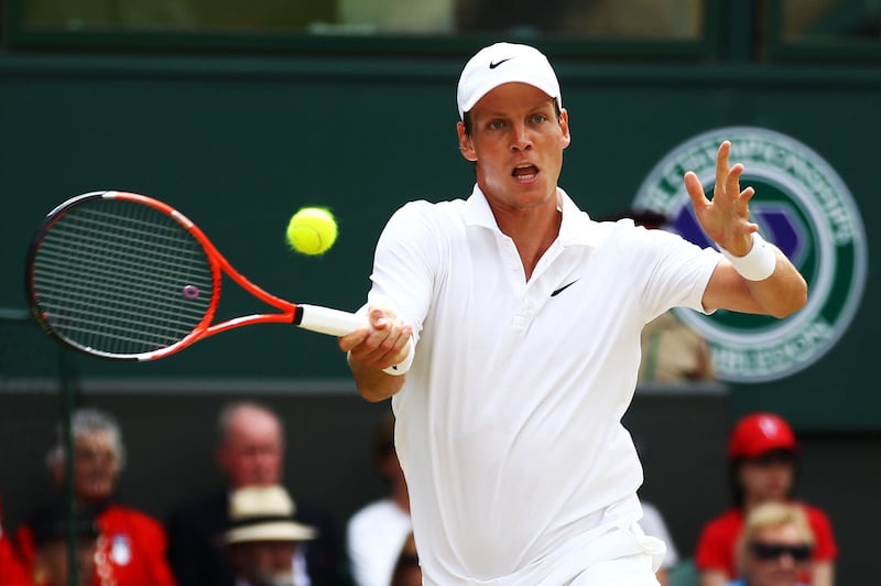 LONDON, ENGLAND - JUNE 30:  Tomas Berdych of Czech Republic plays a shot during his Quarter Final match against Roger Federer of Switzerland on Day Nine of the Wimbledon Lawn Tennis Championships at the All England Lawn Tennis and Croquet Club on June 30, 2010 in London, England.  (Photo by Julian Finney/Getty Images)
