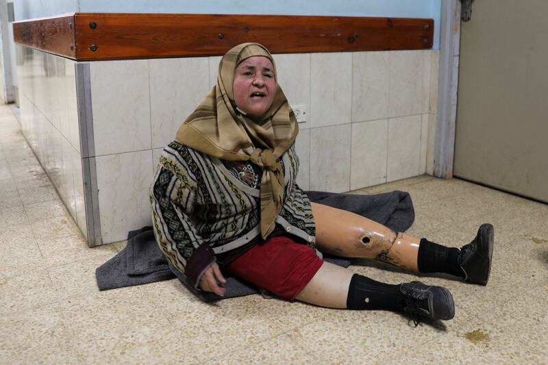 Palestinian woman Amal Abu Hashesh, who escaped with her prosthetic leg after her house was hit by an Israeli strike, takes shelter in the European Hospital. Reuters