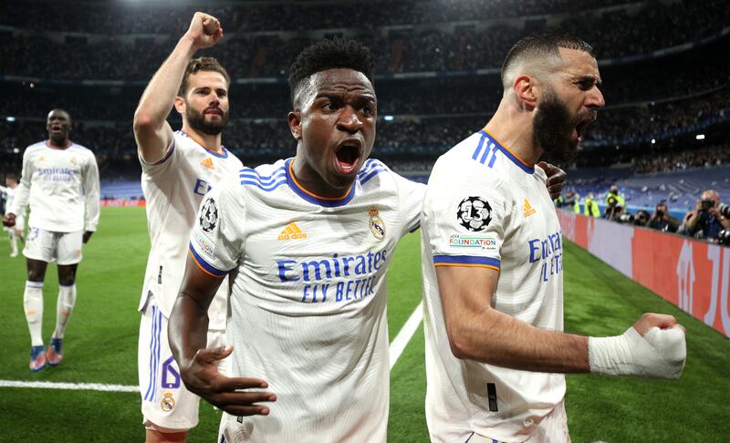 Real Madrid's Karim Benzema celebrates after scoring the third goal in the 3-1 extra-time win against Manchester City for a 6-5 aggregate victory and a place in the Champions League final against Liverpool. Getty