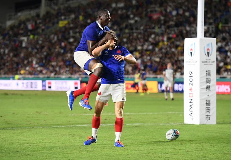 France's Baptiste Serin celebrates with France's Yacouba Camara scoring their fourth try, France v USA - Fukuoka Hakatanomori Stadium, Fukuoka, Japan. REUTERS