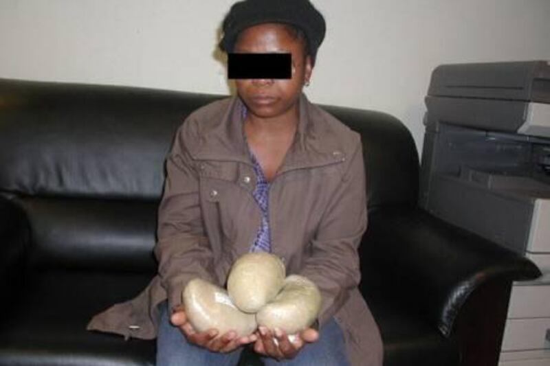  A woman was caught at the Dubai airport trying to smuggle almost two kilograms of cocaine taped to her body, police said yesterday. The suspect, identified by Dubai Police as MM, from an African country, was arrested in the transit lounge of Dubai Airport last week after officers said she was acting suspicious. 

Courtesy Dubai Police
