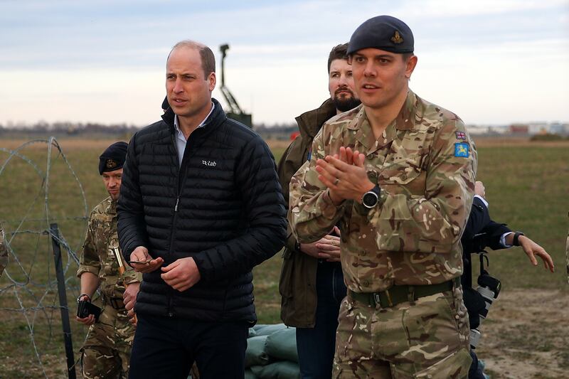 Prince William meets soldiers during a visit to the British military base in Jasionka, south-east Poland. EPA