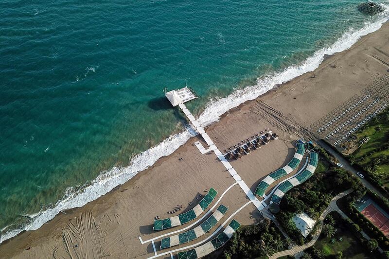 An empty beach at Lara district in Antalya, a popular holiday resort in southern Turkey.  AFP