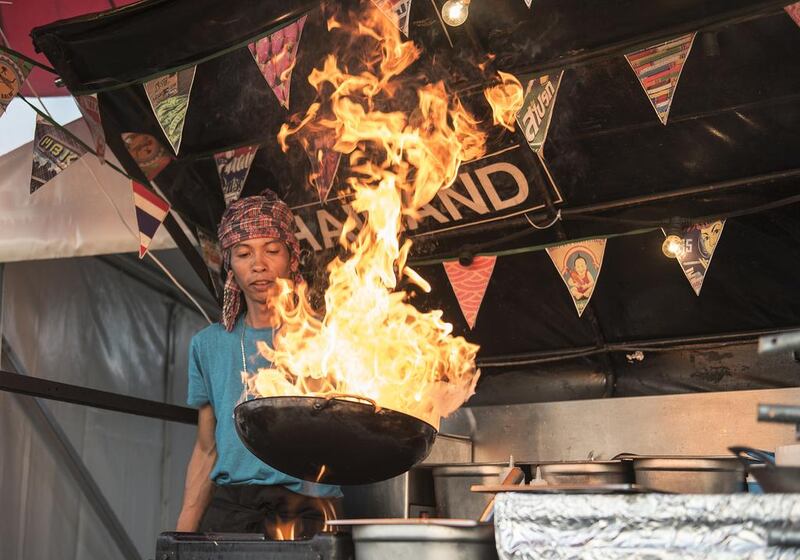 Chef Dong prepares some Thai street food in the Bangwok truck, which is part of the 'British crew'. Vidhyaa for The National