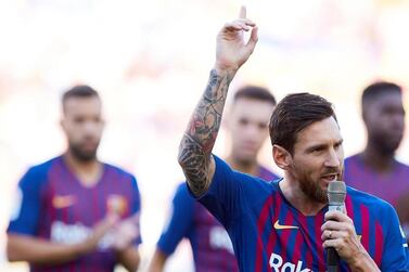 Lionel Messi tells fans at the Camp Nou following a 3-0 win over Boca Juniors in the Gamper Trophy that winning the Champions League is the club's priority this season. EPA