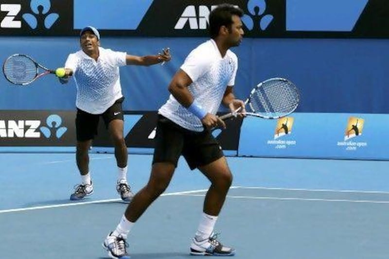 Mahesh Bhupath, left, playing with Leander Paes.