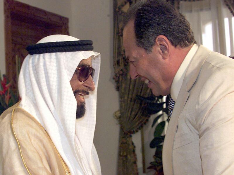 In this file picture dated 18 April 2000, United Arab Emirates (UAE) President Sheikh Zayed bin Sultan al-Nahayan (L) welcomes Lebanese president Emile Lahoud in Abu Dhabi. The UAE's president and founding father died 02 November 2004, his office announced. The announcement, which did not immediately give more details, was reported by official media while Emirati television stations aired verses from the Koran, the Muslim holy book. The ailing Sheikh Zayed, who was nearly 90, had governed the seven-member oil-rich Gulf federation since its birth in 1971. AFP PHOTO/JOSEPH BARRAK (Photo by JOSEPH BARRAK / AFP)