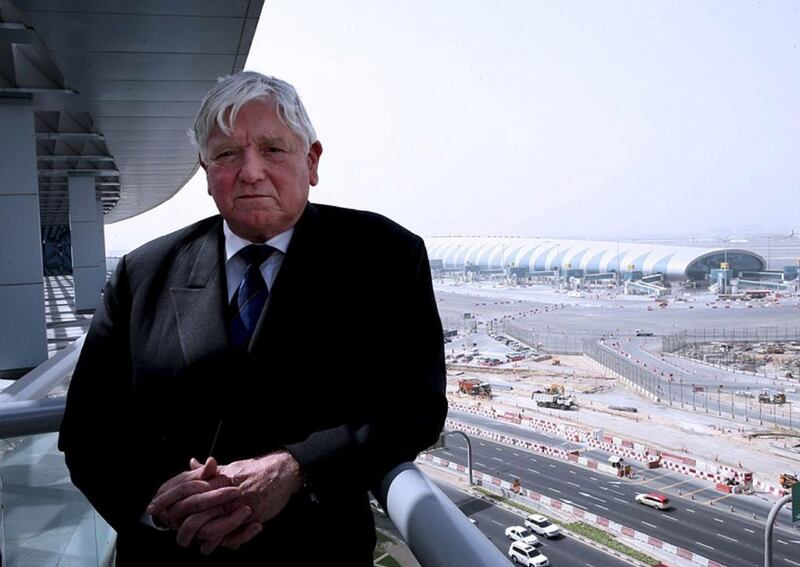 Maurice Flanagan, Executive Vice Chairman of Emirates Airline and Group, poses for a photograph behind the Dubai Airport Terminal 1 during an interview at Emirates Headquarters in Dubai. Paulo Vecina / The National